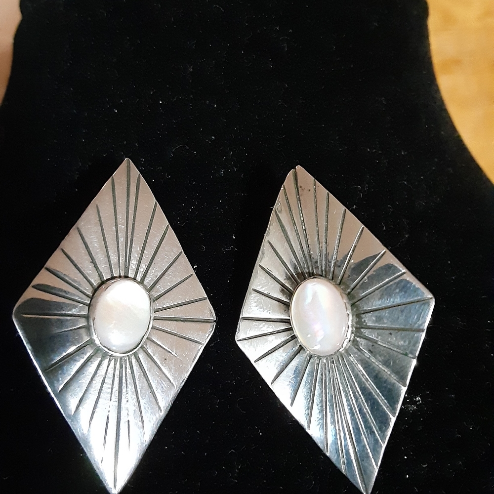 Sterling silver earrings with pink stone. Posts.